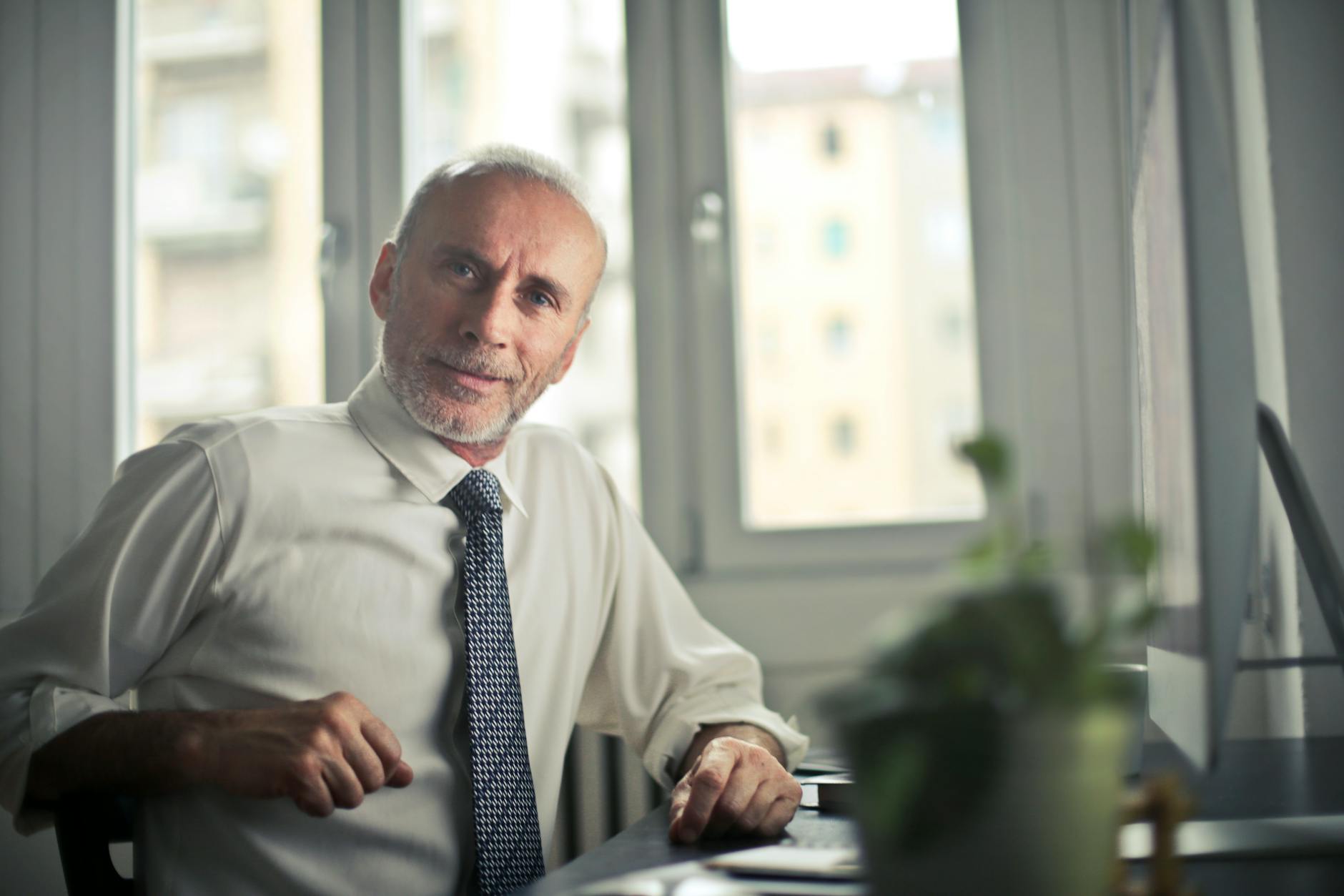 Photo by Andrea Piacquadio on <a href="https://www.pexels.com/photo/man-sitting-on-chair-beside-table-834863/" rel="nofollow">Pexels.com</a>