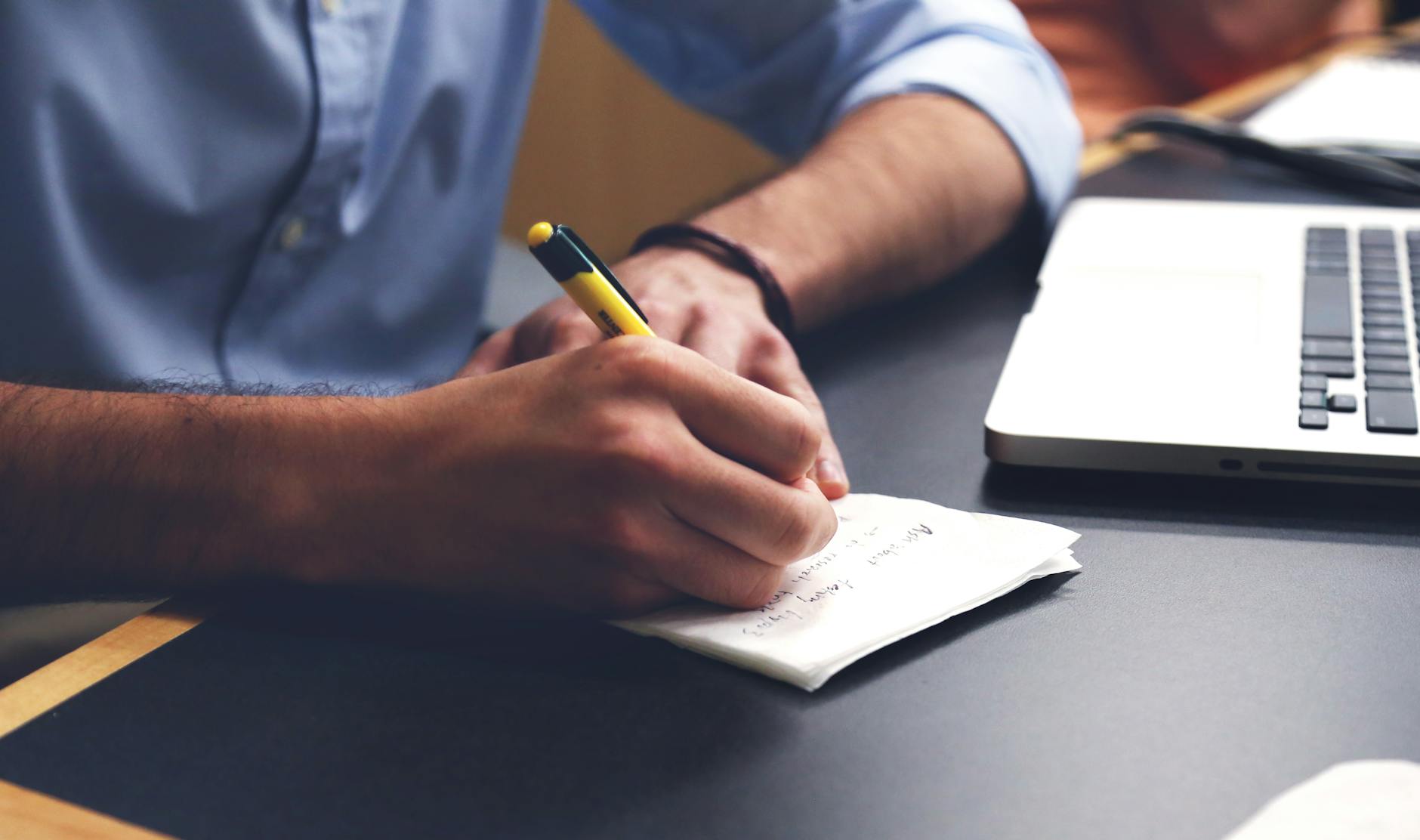 Photo by Startup Stock Photos on <a href="https://www.pexels.com/photo/person-writing-on-paper-using-yellow-and-black-pen-7103/" rel="nofollow">Pexels.com</a>