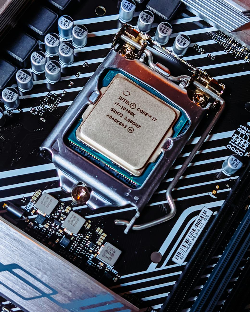 Photo by Tech Kiga on <a href="https://www.pexels.com/photo/processor-in-a-motherboard-11559638/" rel="nofollow">Pexels.com</a>