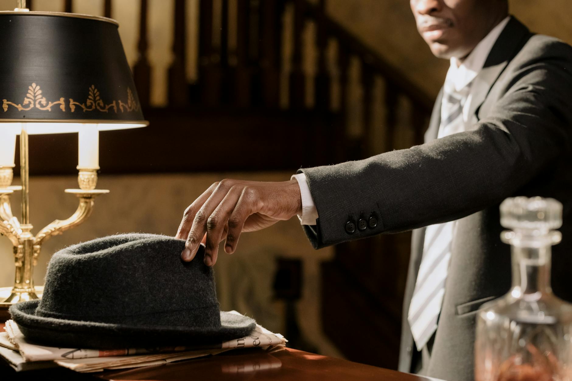 Photo by cottonbro studio on <a href="https://www.pexels.com/photo/photo-of-person-holding-his-fedora-hat-7319079/" rel="nofollow">Pexels.com</a>