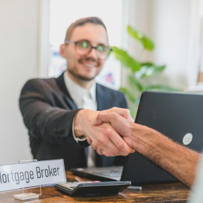 Photo by RDNE Stock project on <a href="https://www.pexels.com/photo/a-broker-shaking-having-a-deal-with-the-person-sitting-in-front-of-him-8293768/" rel="nofollow">Pexels.com</a>